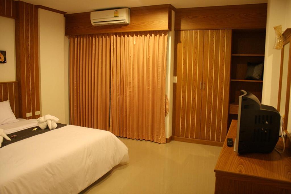 Santi White Hotel Phuket Стая снимка